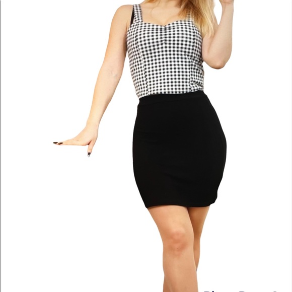 Dresses & Skirts - EUC Black Skirt sz L made by XINLONG GARMENT CO.